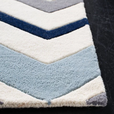 Dublin Chevron Geometric Tufted Area Rug - Safavieh - Image 2