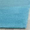 Mandy Solid Tufted Rug - Safavieh